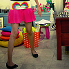 Girl\\'s legs and pink skirt
